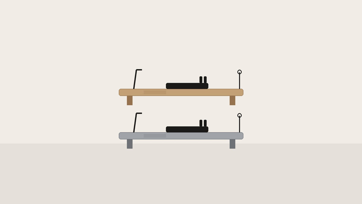 Illustratie van een houten en een aluminium Pilates reformer